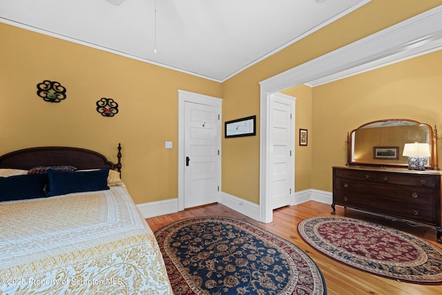 1012 Sunset St, Scranton, PA 18509 - bedroom with wood finished floors and crown molding