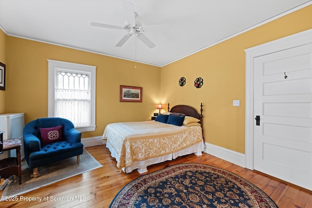 1012 Sunset St, Scranton, PA 18509 - bedroom with light wood-style flooring, crown molding, and a ceiling fan
