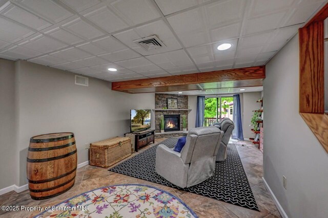 993 Oakmont Rd, Clarks Summit, PA 18411 - living area featuring a large fireplace, baseboards, and recessed lighting