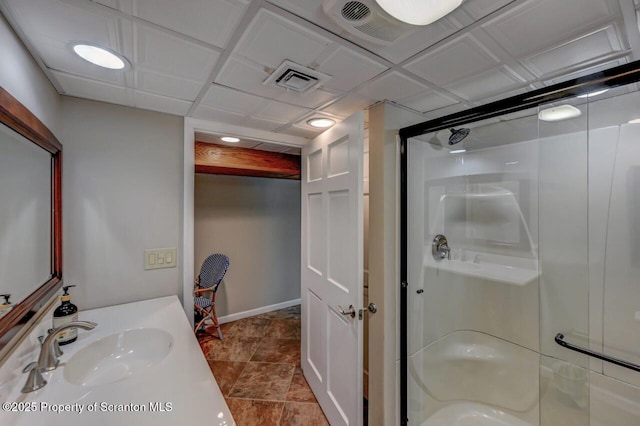 993 Oakmont Rd, Clarks Summit, PA 18411 - full bathroom featuring a stall shower, vanity, and baseboards