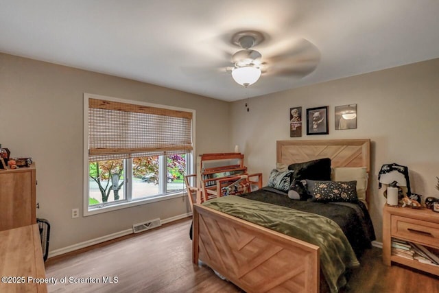 993 Oakmont Rd, Clarks Summit, PA 18411 - bedroom featuring wood finished floors, baseboards, and ceiling fan
