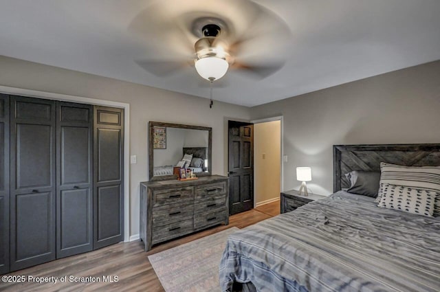 993 Oakmont Rd, Clarks Summit, PA 18411 - bedroom with wood finished floors, baseboards, and ceiling fan