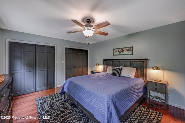 993 Oakmont Rd, Clarks Summit, PA 18411 - bedroom with multiple closets, wood finished floors, baseboards, and ceiling fan