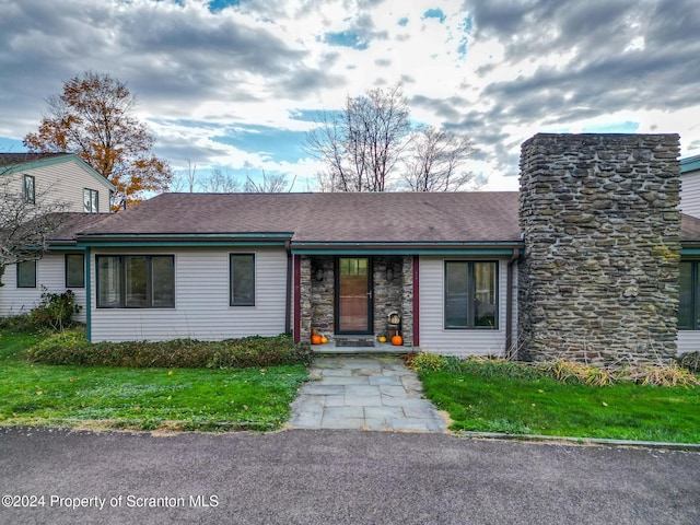 view of front of house with a front yard