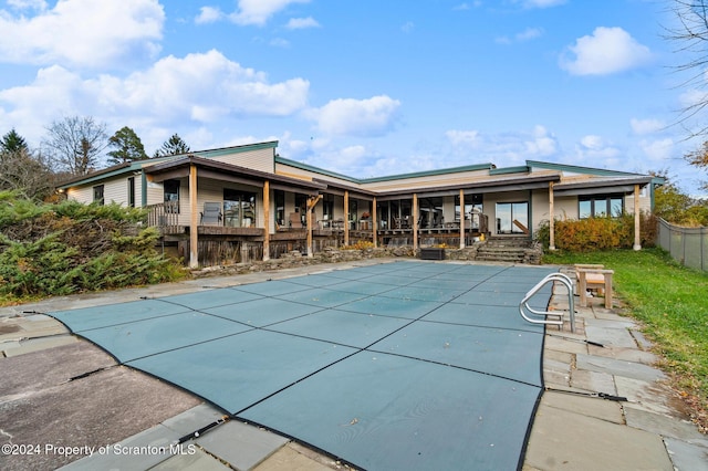 view of swimming pool with a patio