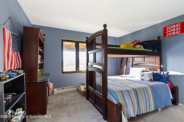 carpeted bedroom with a baseboard heating unit