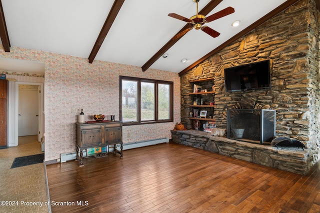 unfurnished living room featuring ceiling fan, a baseboard heating unit, a fireplace, vaulted ceiling with beams, and wood-type flooring