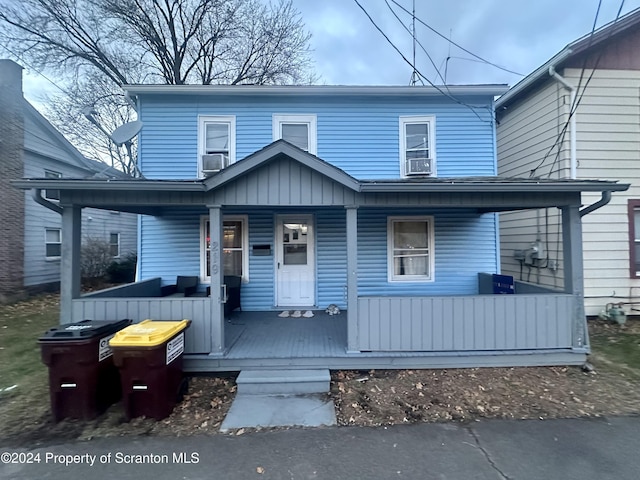 front facade featuring covered porch