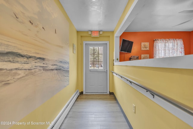 entryway with light hardwood / wood-style floors