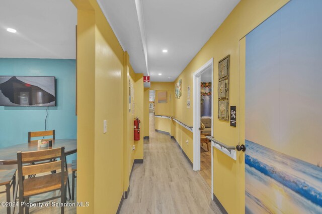 hall featuring light hardwood / wood-style flooring