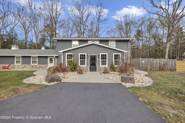 view of property with a front lawn