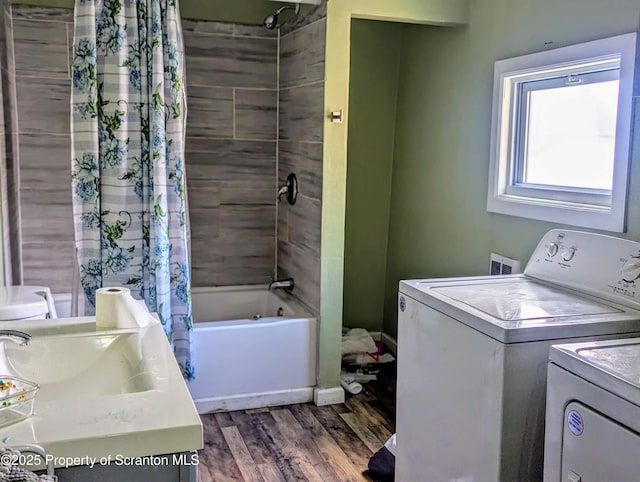 730732 Minooka Ave, Moosic, PA 18507 - full bath with vanity, washer and dryer, shower / tub combo with curtain, and wood finished floors