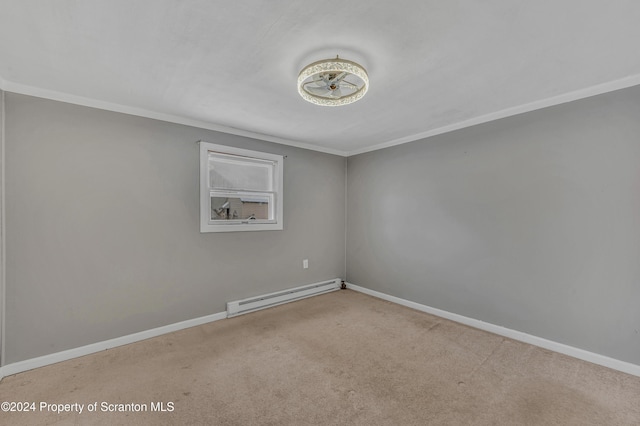 spare room featuring baseboard heating and carpet floors