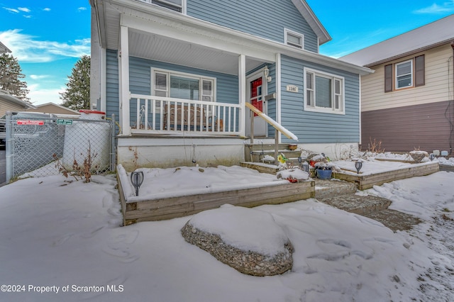 view of front of home featuring covered porch