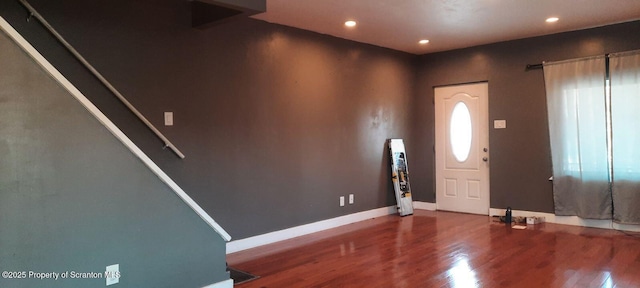 foyer entrance featuring hardwood / wood-style floors