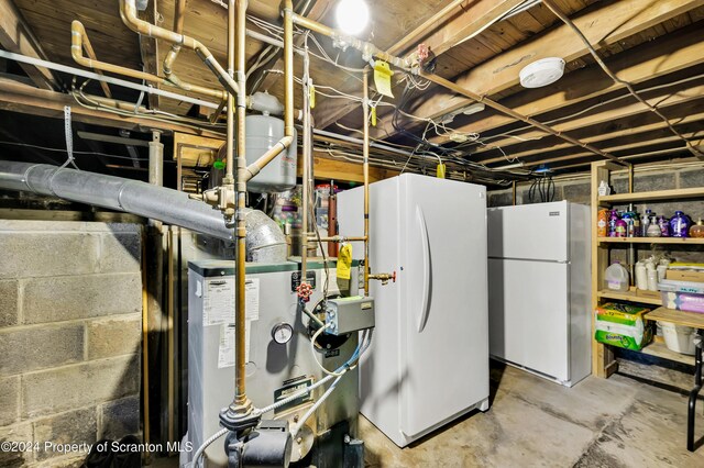 utility room with gas water heater