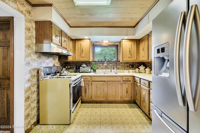 kitchen featuring stainless steel fridge, sink, wooden ceiling, and white range