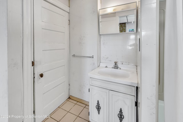 bathroom featuring tile patterned floors and vanity