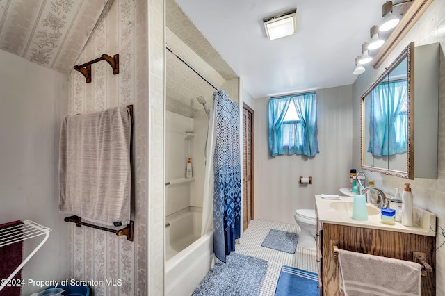 full bathroom with tile patterned floors, vanity, toilet, and shower / bathtub combination with curtain