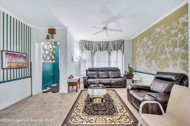 carpeted living room with plenty of natural light, ceiling fan, and ornamental molding