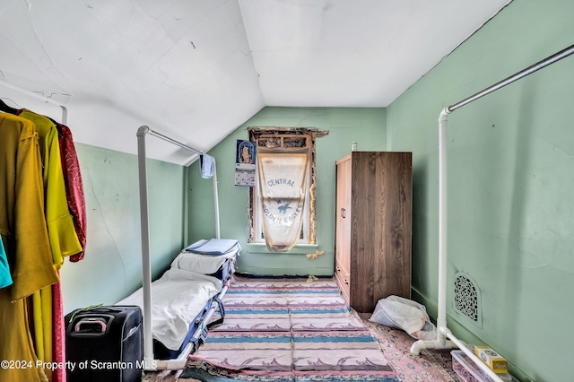 bedroom with vaulted ceiling