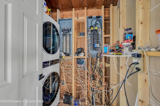 149 Lincoln Green Ln, Newfoundland, PA 18445 - clothes washing area with a workshop area, wooden ceiling, and stacked washer and clothes dryer