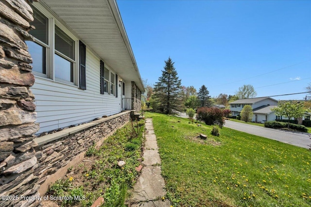 906 Violet Ter, Clarks Summit, PA 18411 - view of home's exterior featuring a yard