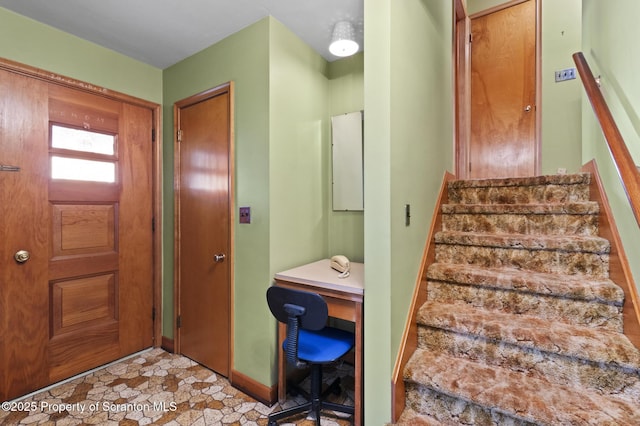 817 Miles Ave, Dickson City, PA 18447 - interior space with baseboards and stone finish floor