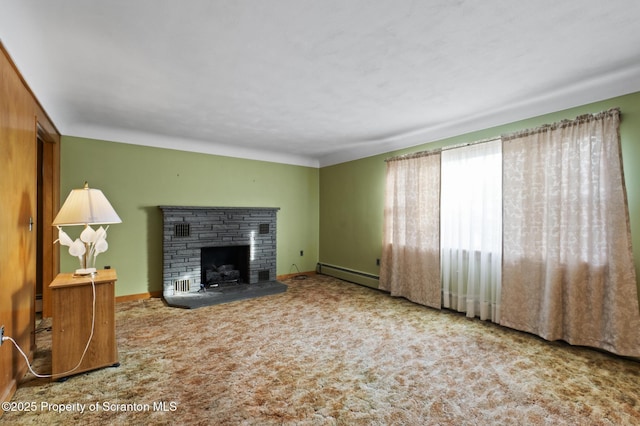 817 Miles Ave, Dickson City, PA 18447 - unfurnished living room featuring a fireplace, carpet, baseboard heating, and baseboards