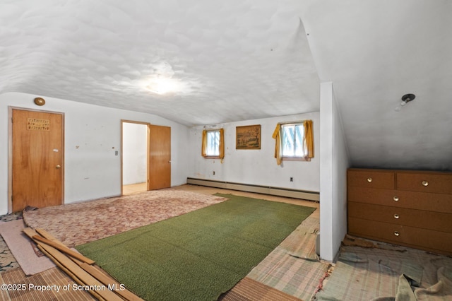817 Miles Ave, Dickson City, PA 18447 - additional living space with baseboard heating and lofted ceiling