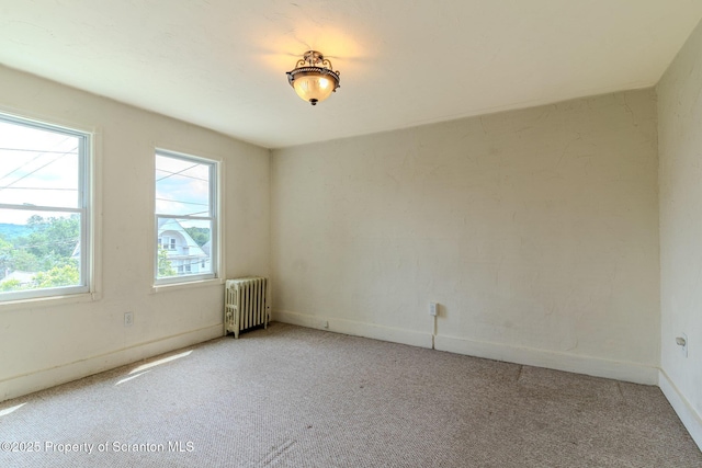 51 Plank St, Pittston, PA 18640 - spare room with radiator and light colored carpet
