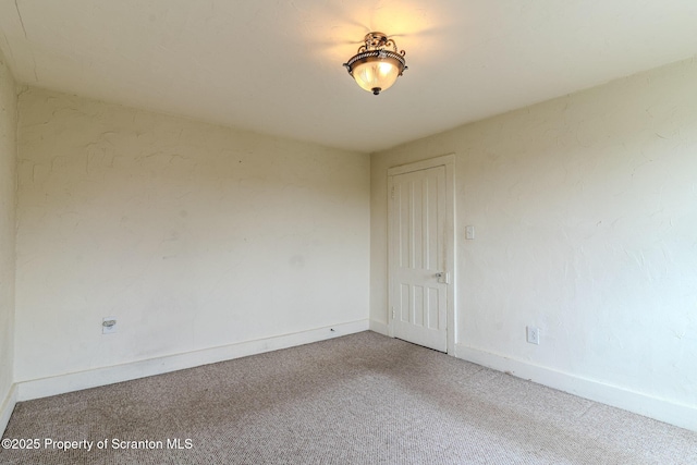51 Plank St, Pittston, PA 18640 - carpeted empty room with baseboards