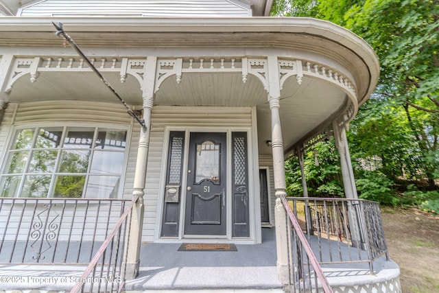 51 Plank St, Pittston, PA 18640 - doorway to property featuring a porch