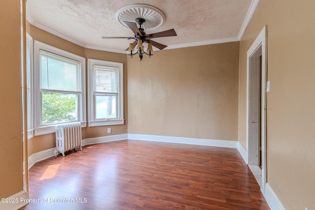 51 Plank St, Pittston, PA 18640 - spare room with radiator, wood finished floors, a ceiling fan, ornamental molding, and a textured ceiling