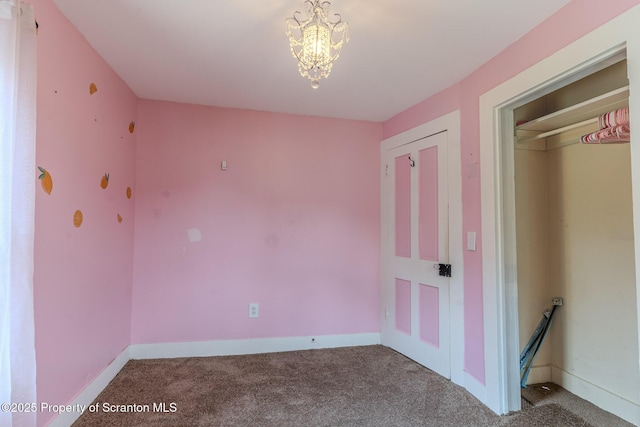 51 Plank St, Pittston, PA 18640 - unfurnished bedroom with carpet and a chandelier