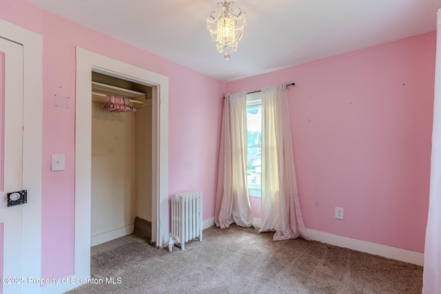 51 Plank St, Pittston, PA 18640 - unfurnished bedroom with radiator, a chandelier, and carpet floors