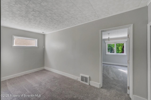 446 10th Ave, Scranton, PA 18504 - carpeted empty room with ornamental molding