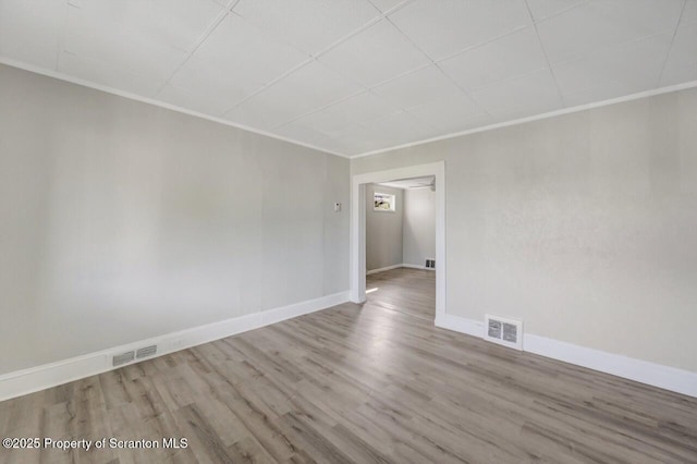 446 10th Ave, Scranton, PA 18504 - unfurnished room with wood finished floors and baseboards