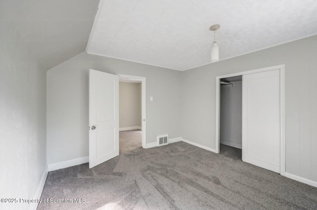 446 10th Ave, Scranton, PA 18504 - unfurnished bedroom featuring carpet, a closet, and lofted ceiling