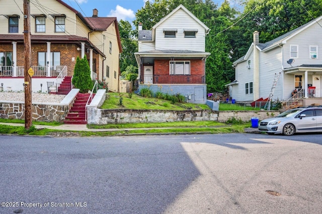 446 10th Ave, Scranton, PA 18504 - view of front of house with brick siding and stairs