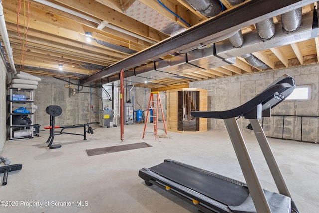 exercise area with heating unit and water heater