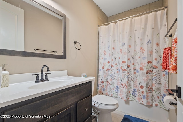 full bathroom featuring vanity, toilet, and shower / bath combo with shower curtain