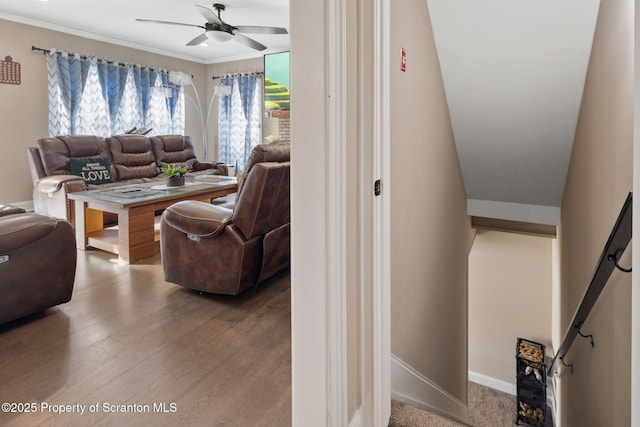 living room with ceiling fan, hardwood / wood-style floors, and ornamental molding