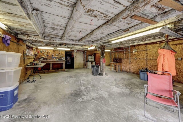 basement with a workshop area