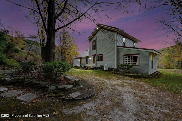 view of property exterior at dusk