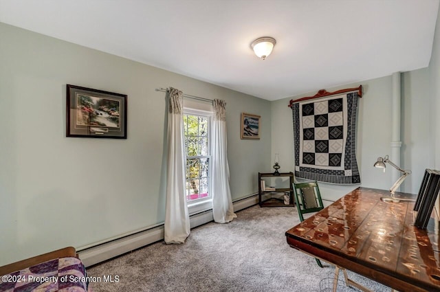 carpeted office with a baseboard radiator