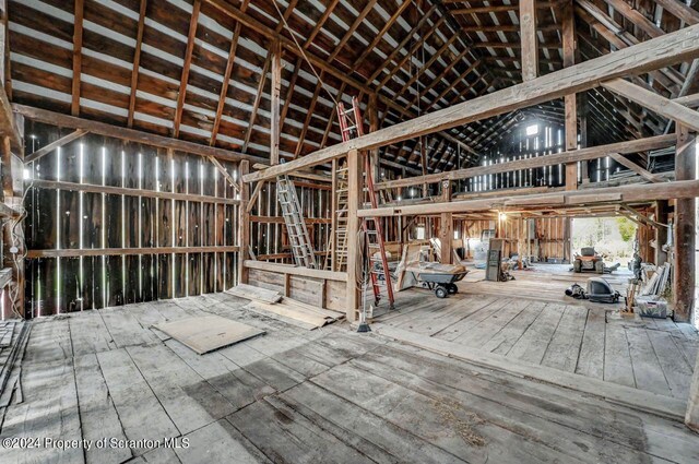 misc room featuring high vaulted ceiling