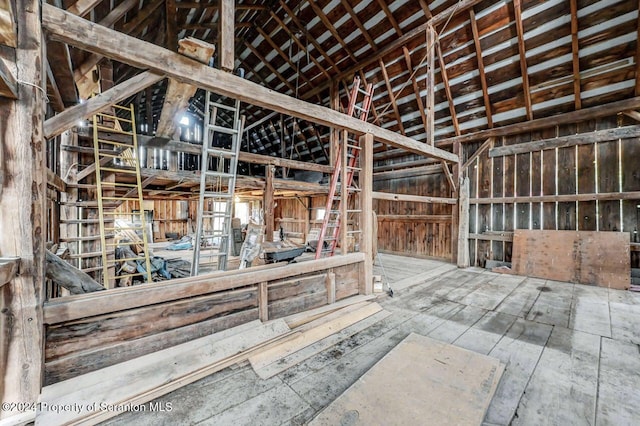 misc room featuring lofted ceiling