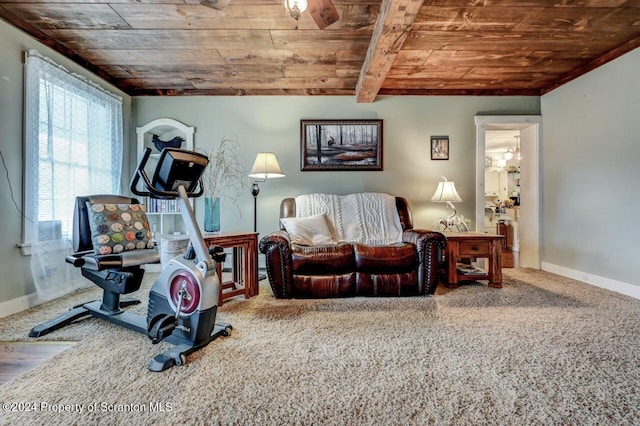 interior space featuring carpet floors and wood ceiling