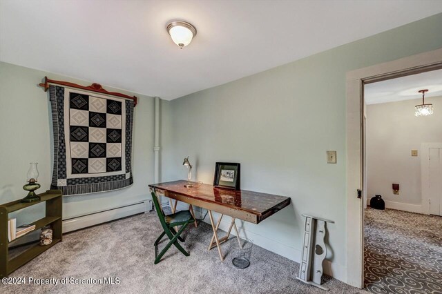 office space with carpet flooring and a baseboard radiator